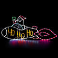 Neon-style LED outline of Santa riding a rocket with HO HO HO lettering on a black background
