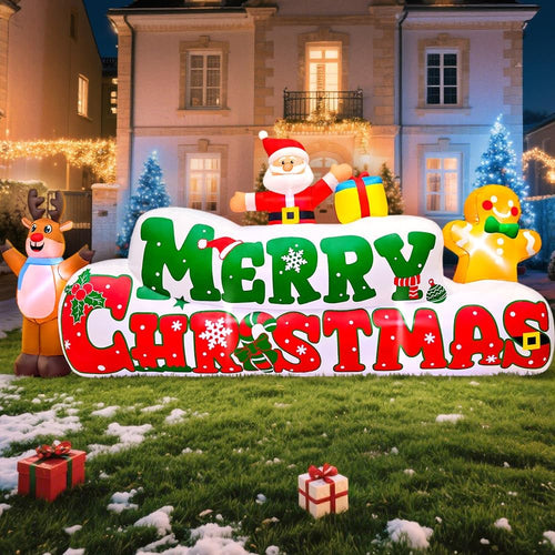 Inflatable MERRY CHRISTMAS sign with Santa, a gingerbread man and a reindeer on a snowy lawn