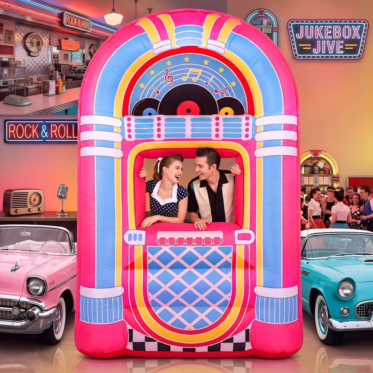 Inflatable retro jukebox in pink and blue at a fifties-themed party with classic cars