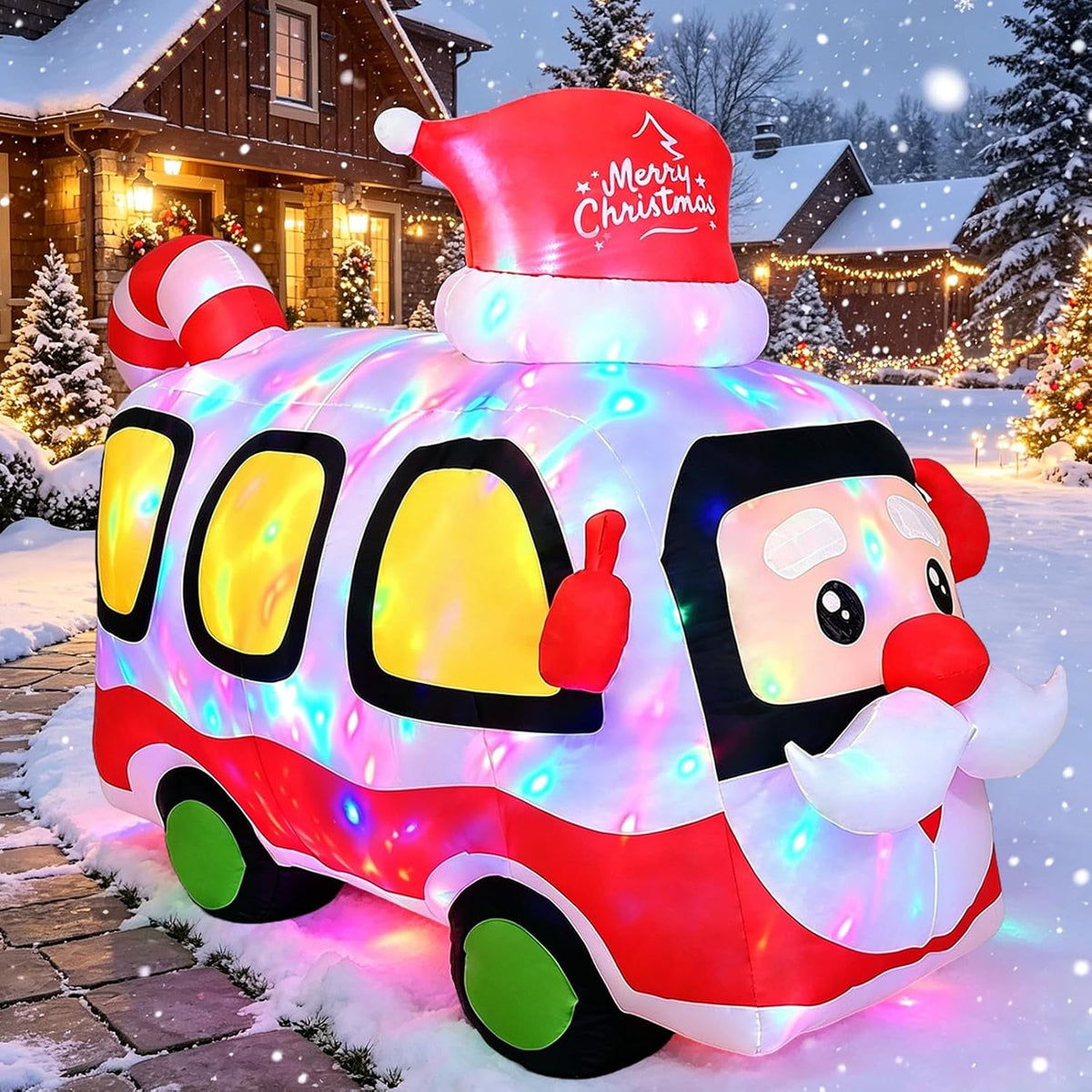 Inflatable holiday bus with Santa at the wheel glowing with colored lights in a snowy street