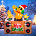 Inflatable gingerbread man in sunglasses and a Santa hat at a Merry Christmas DJ booth