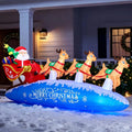 Inflatable Santa in a red sleigh pulled by reindeer on a blue Merry Christmas base in front of a porch